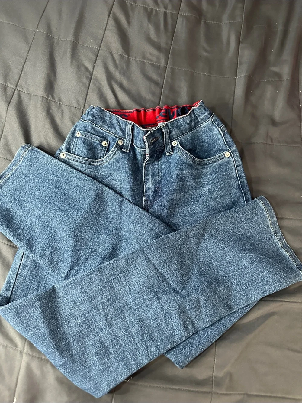 Levi's Straight Men’s Jeans in Medium Blue with Red Waistband Accent